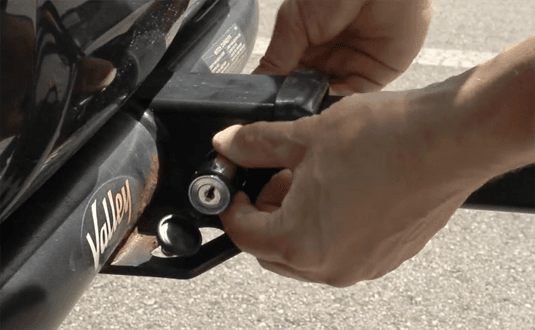 lockable hitch pin in position on a trailer hitch