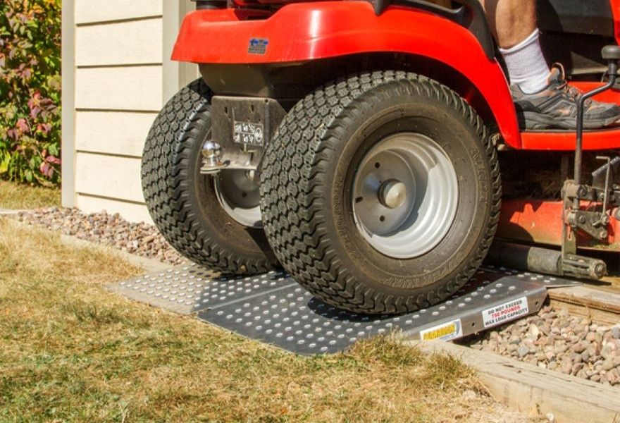 view of ramp being driven on by a lawn mower