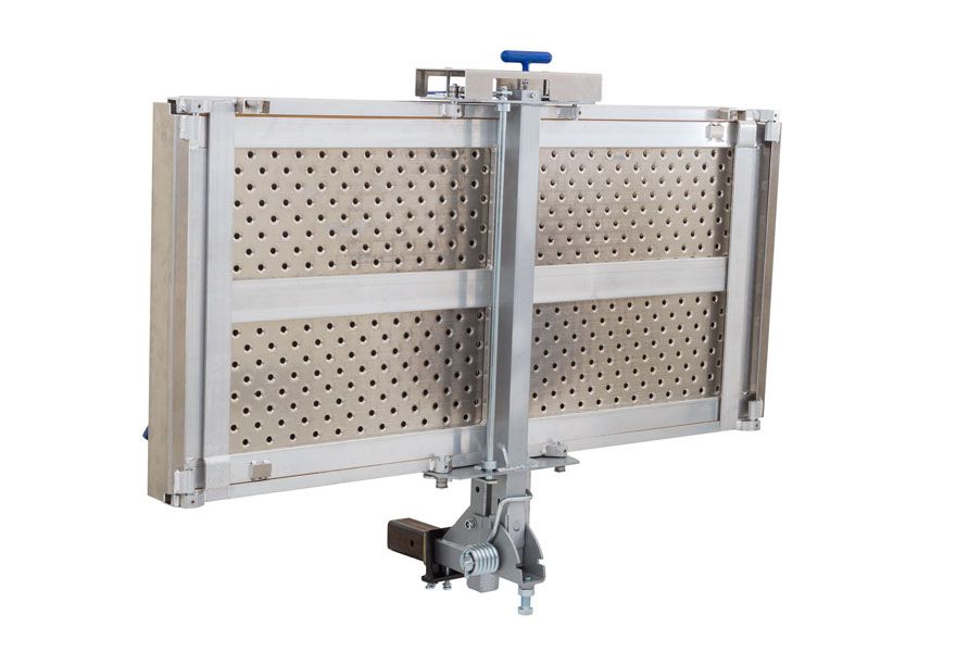 Carrier folds up against vehicle when not in use 