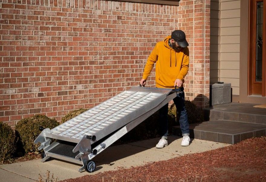wheelchair ramp with transport wheels