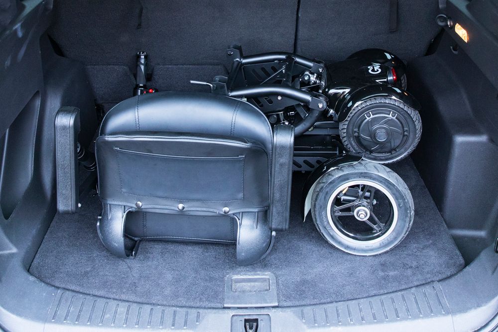 mobility scooter in the back of a trunk