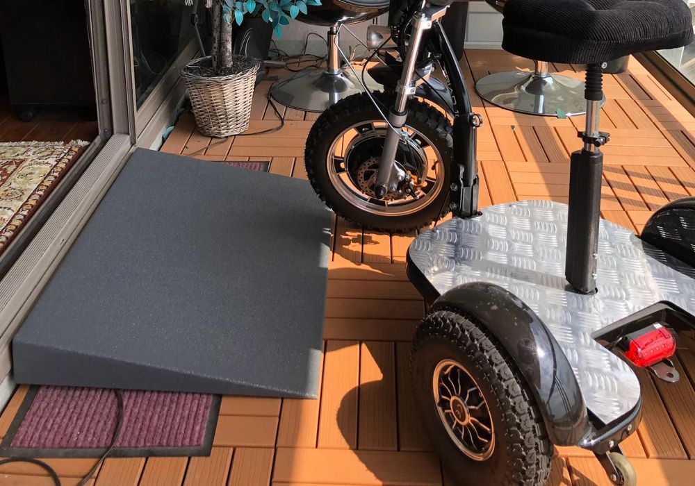 VersaRamp foam threshold ramp at an entryway with a scooter