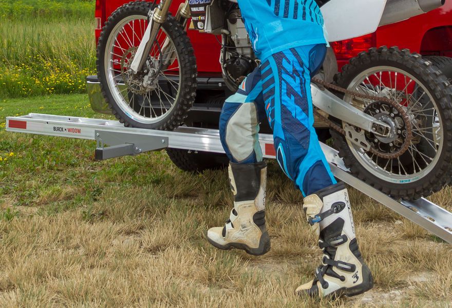 Self-storing ramp fits left or right side for quick loading and unloading