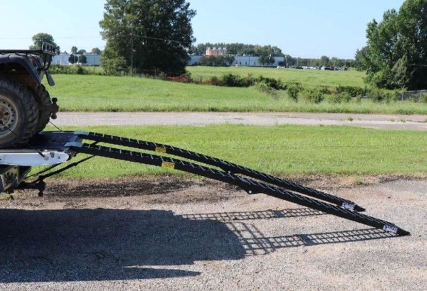 Arched loading ramps for ATVs and four-wheeled vehicles