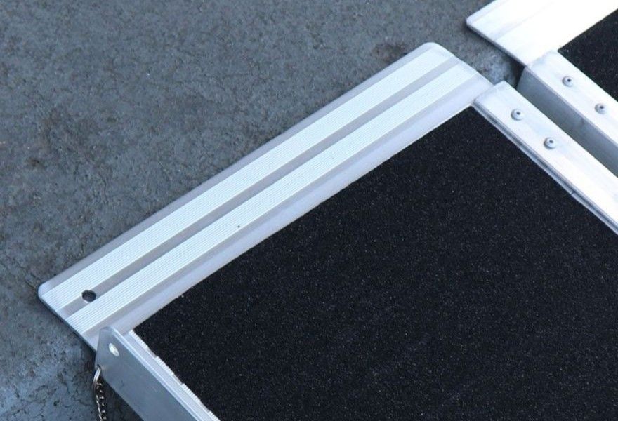 angled transition plate on wheelchair ramp
