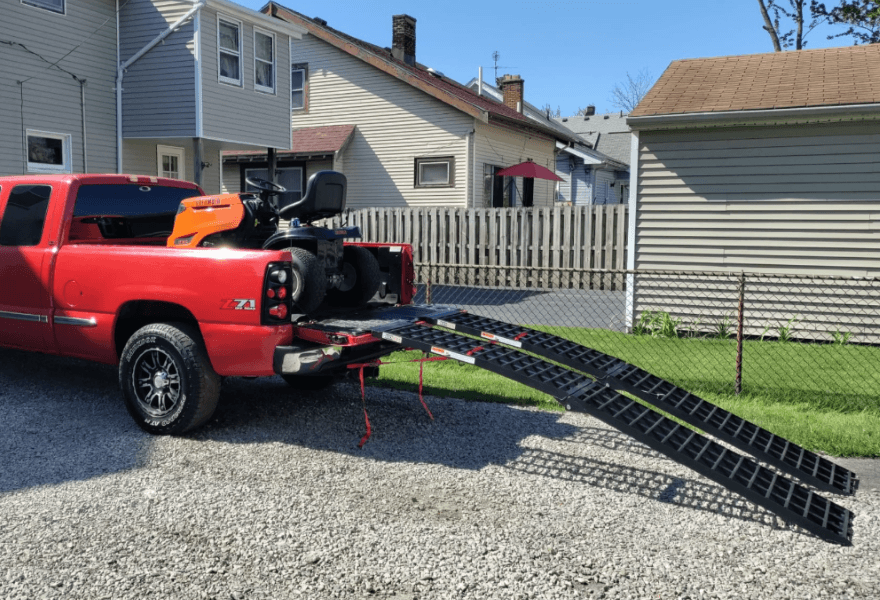 Arched motorcycle ramps with serrated cross rungs
