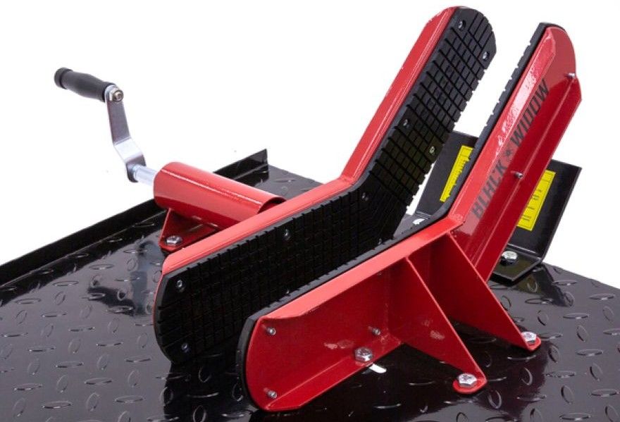 Motorcycle lift with front wheel clamp and safety features