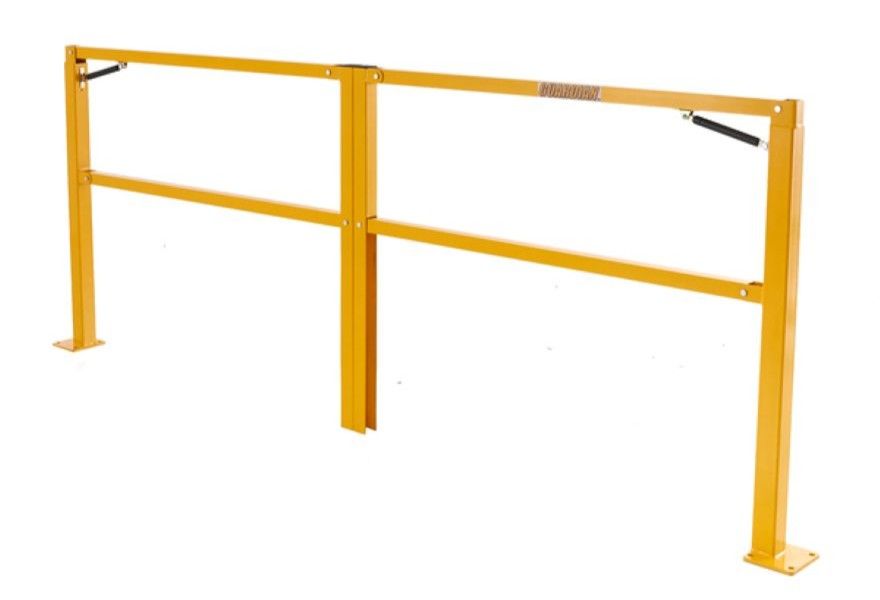 Yellow dock safety gate spanning a loading dock opening