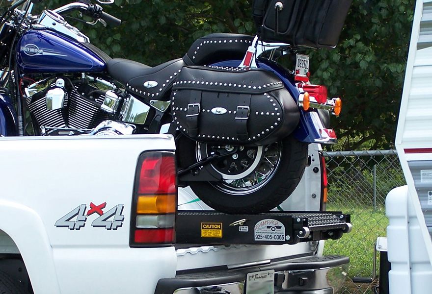 Motorcycle loaded on Rampage system in a short bed truck