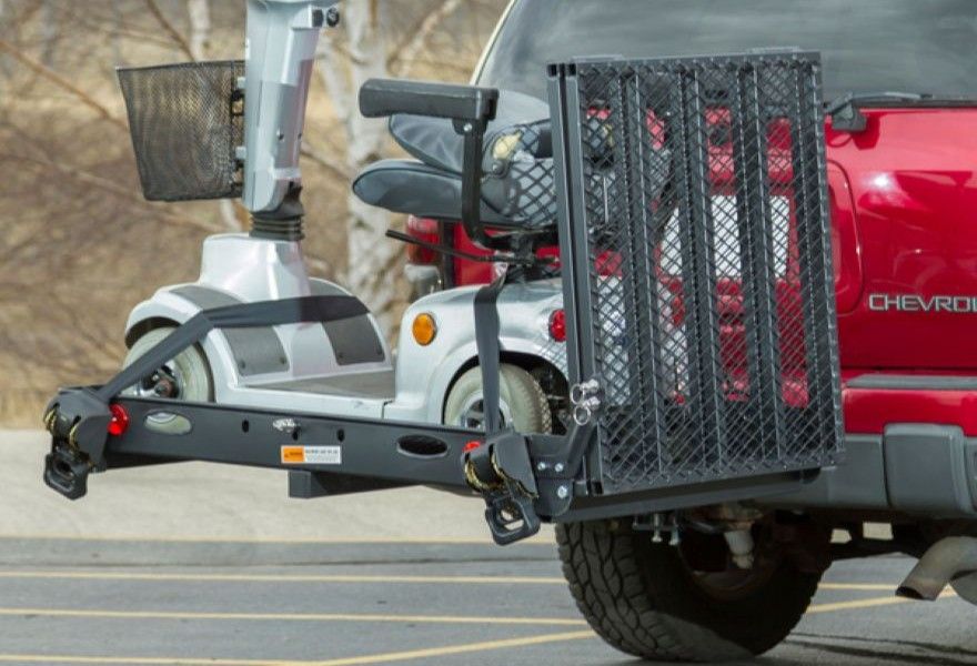 mobility scooter secured on heavy-duty carrier