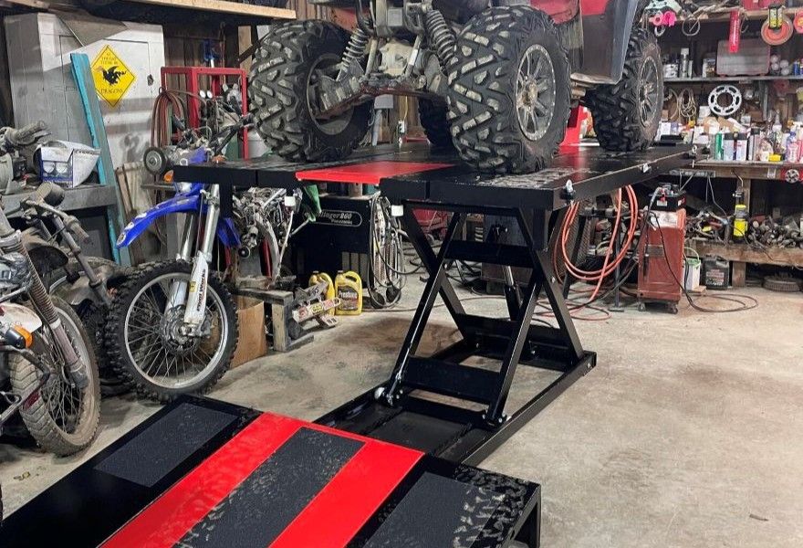 Air and hydraulic powersports lift table